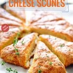 These Easy Cheese Scones are cheesy, savoury, buttery, and flakey. Full of smoked cheese, cream cheese, and herbs, they are a great addition to a cheese platter. Perfect for Mother's Day Brunch or an afternoon tea | imagelicious.com #scones #cheesescones #afternoontea #mothersday