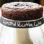 This delicious Gluten-free Almond Ricotta Chocolate Cake is perfect for a Valentine's Day dinner. It's moist, dense, flavourful, and healthy. It's filled with healthy ricotta and almonds, has very little sugar and no oil or butter | Imagelicious