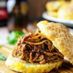 This Slow Cooker Beer Pulled Pork is easy to prepare, feeds a crowd, tastes delicious and is a little bit lighter than traditional recipes. Perfect for winter months and entertaining | Imagelicious