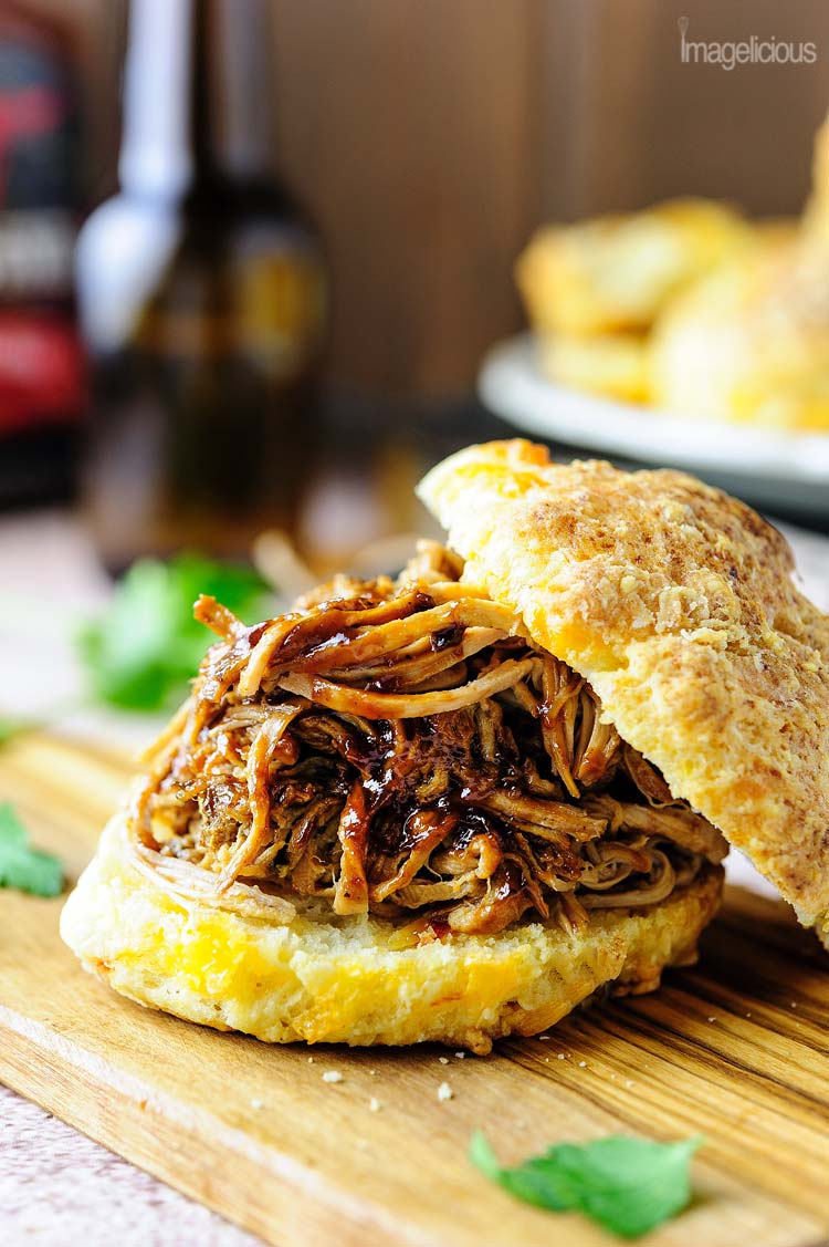This Slow Cooker Beer Pulled Pork is easy to prepare, feeds a crowd, tastes delicious and is a little bit lighter than traditional recipes. Perfect for winter months and entertaining | Imagelicious
