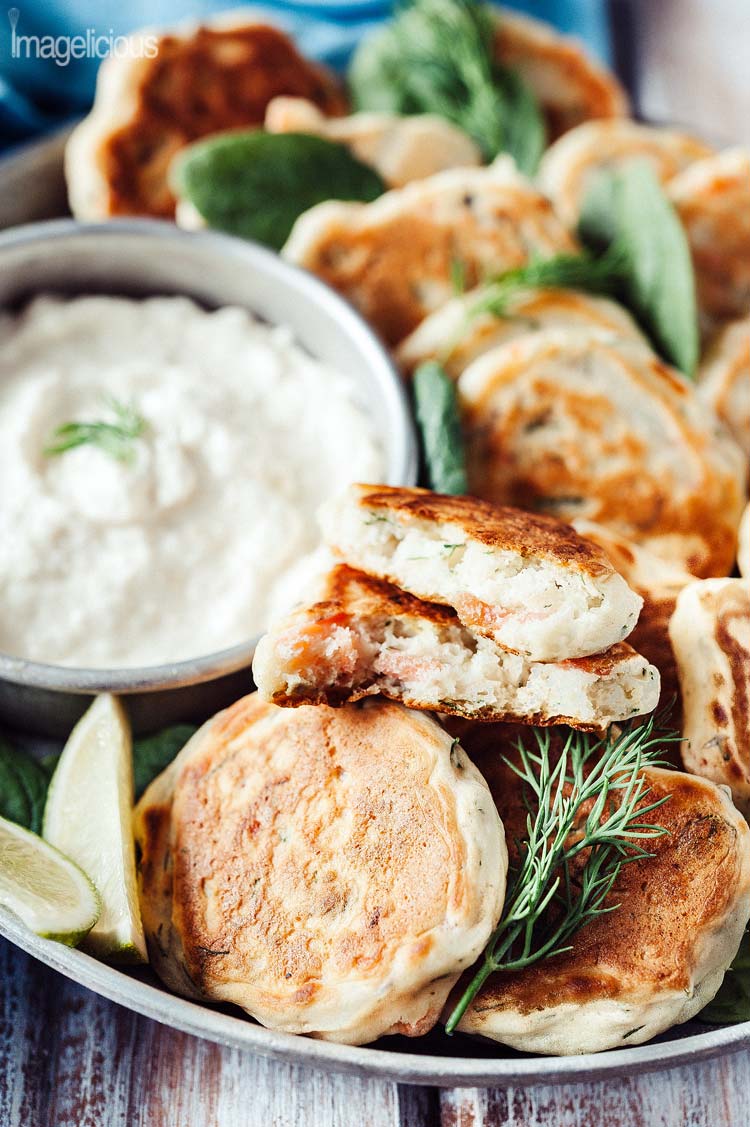 These Smoked Salmon and Dill Mini Pancakes with Horseradish Dip are a perfect appetizer to serve with a glass of sparkling wine and an excellent addition to any brunch | Imagelicious