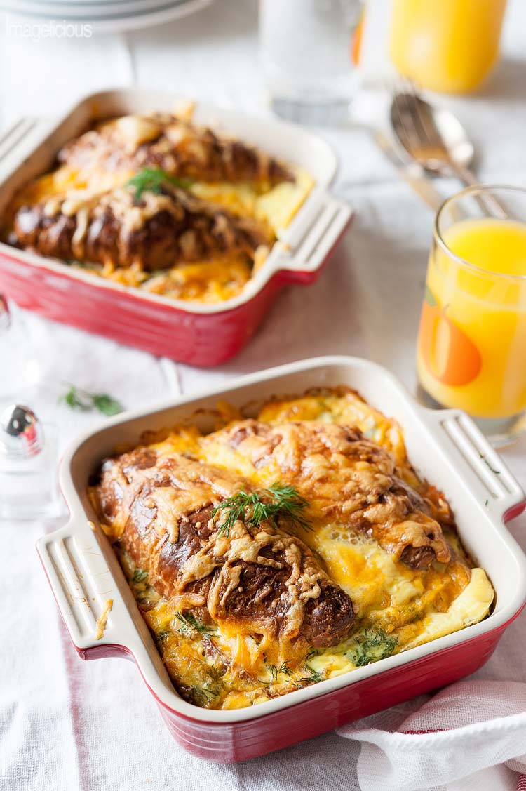 Smoked Salmon Croissant Strata is a perfect brunch dish to make during holidays. Elegant, savoury and a little bit indulgent it's a sure way to please everyone at the table without breaking a bank | Imagelicious