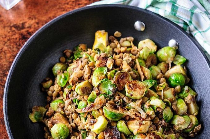 Lentils and Brussels Sprouts skillet is a delicious way of incorporating filling lentils and healthy vegetables into your weeknight meals or meatless mondays. Very quick to prepare the Lentils and Brussels Sprouts are great on their own or as a side to your favourite protein | Imagelicious
