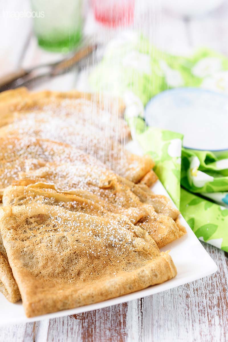 These Matcha Green Tea Crepes are delicate and thin. Flavoured with a hint of floral matcha green tea. Perfect for a lazy weekend breakfast or spring dessert. Great for Easter brunch | Imagelicious