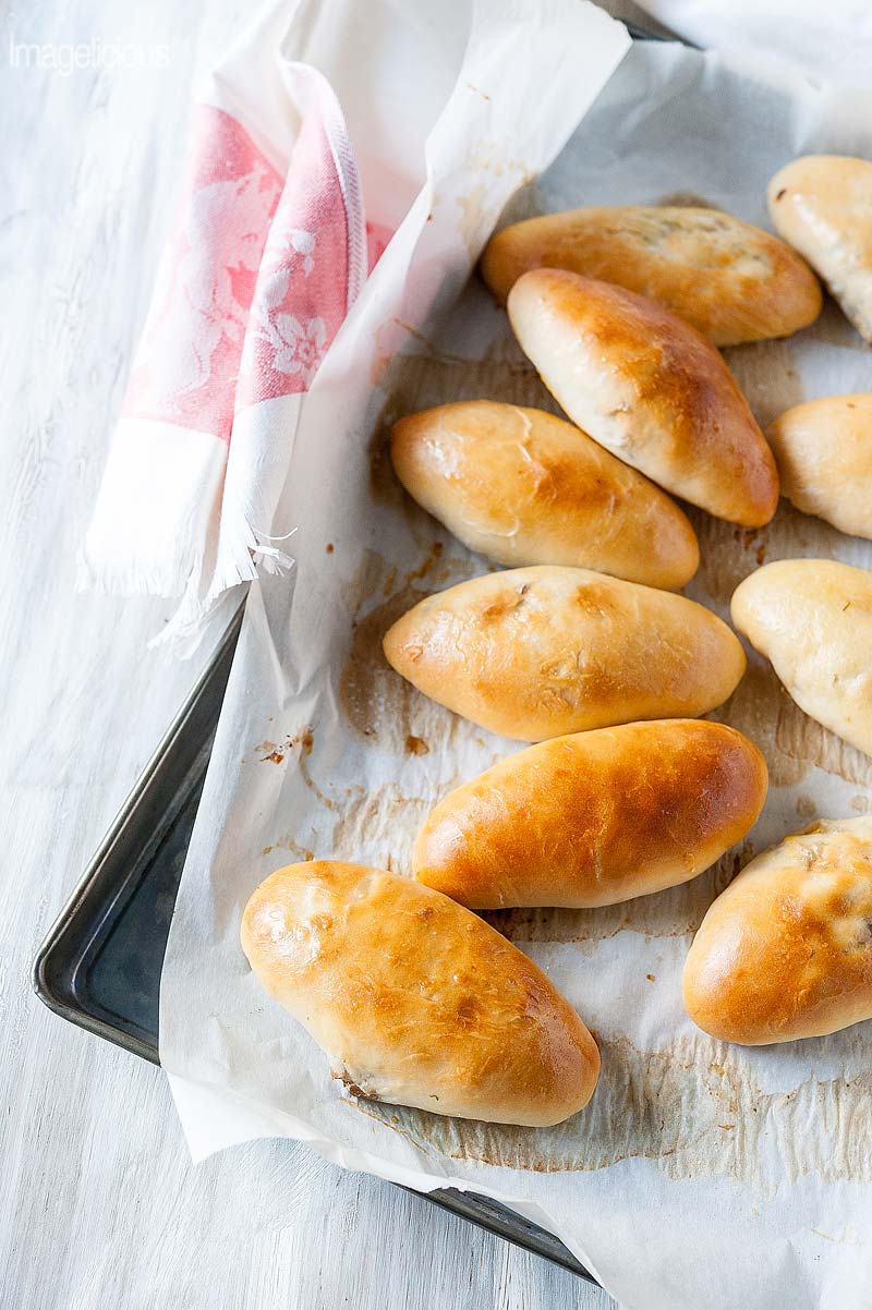 Russian Egg and Onion Hand Pies are a great snack or an appetizer. Add a salad and some veggies and it's a full meal also. They are great to eat on the go and perfect to take to a picnic. Perfect way to use up all the eggs from Easter | Imagelicious