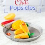 Mango Orange Chili Popsicles are sweet, spicy, and refreshing. Great way to cool down in the summer. Chili pepper adds a fine spicy note to sweet fruit. Naturally sweet, vegan, raw, gluten-free | Imagelicious #glutenfree #vegan #raw #mango #popsicles #frozen #spicy