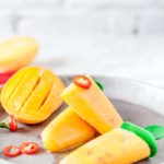 Mango Orange Chili Popsicles are sweet, spicy, and refreshing. Great way to cool down in the summer. Chili pepper adds a fine spicy note to sweet fruit. Naturally sweet, vegan, raw, gluten-free | Imagelicious