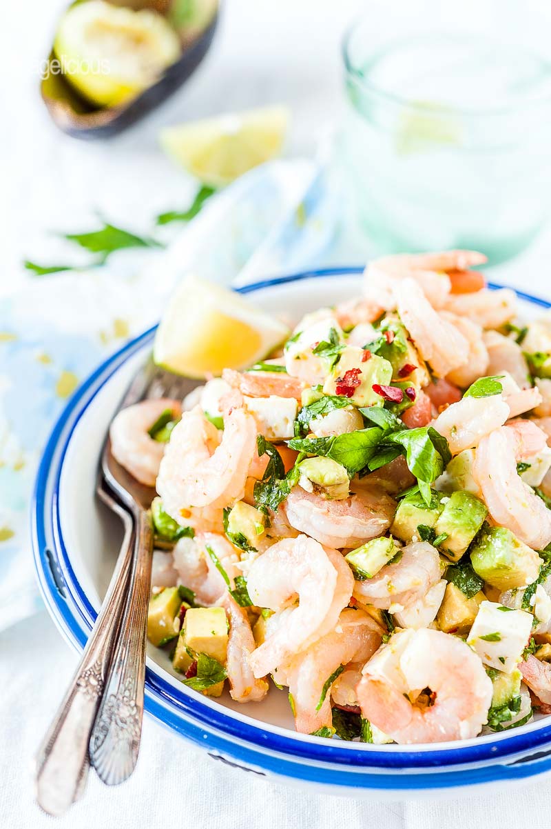 Bowl of Shrimp Avocado and Feta Salad with a fork