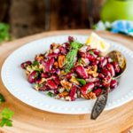 Bean and Pecan Salad is perfect for summer picnics or potlucks. It's made only with a handful of ingredients but has a really bright and vibrant flavour. It's healthy, filling, naturally gluten-free and vegan | Imagelicious
