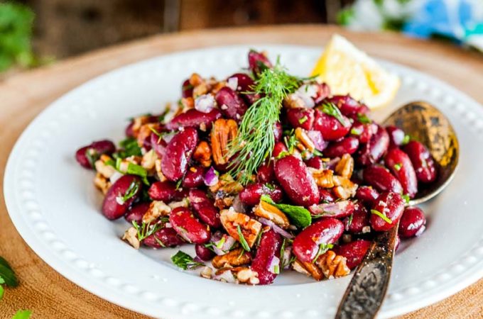 Bean and Pecan Salad is perfect for summer picnics or potlucks. It's made only with a handful of ingredients but has a really bright and vibrant flavour. It's healthy, filling, naturally gluten-free and vegan | Imagelicious