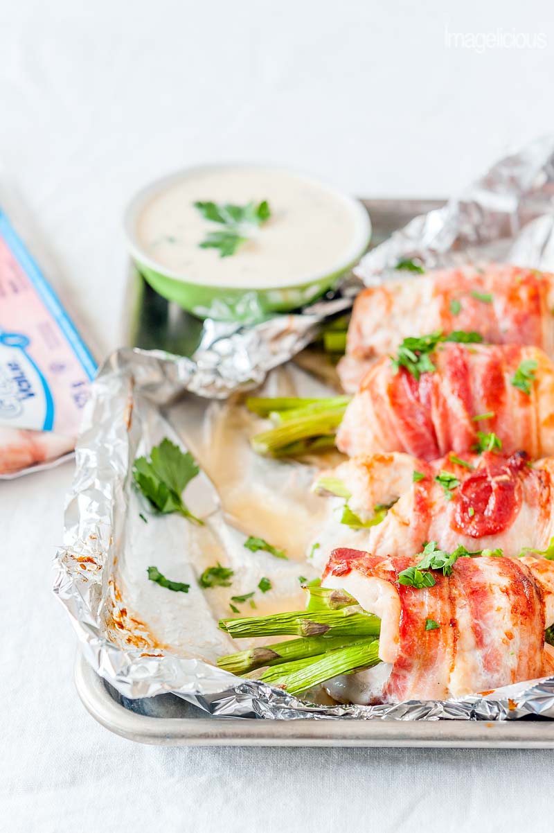 Everything is better with bacon, specially Great Value Bacon! Add bacon and a few asparagus spears to a humble chicken breast and you get a delicious, elegant, and really easy Bacon-Wrapped Chicken - perfect for a weeknight meal or a fancy weekend dinner | #WeLoveGreatValue #ad | Imagelicious