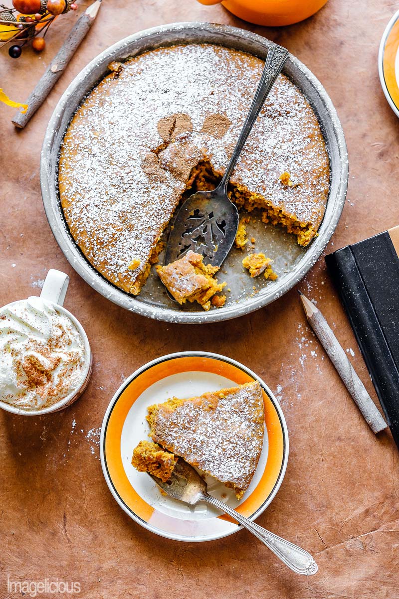 Vegan Pumpkin Cake is the ultimate fall comfort dessert! It's moist and spiced! Perfect with a cup of coffee or tea for breakfast or autumn afternoon snack. Enjoy this cozy dessert and you won't miss any butter or eggs in this recipe. It's so easy, you only need one bowl and one spoon to make this cake | Imagelicious