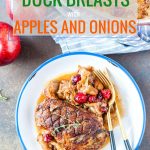 When making these Braised Duck Breasts with Apples and Onions, your kitchen will smell like a high-end restaurant. Succulent duck breasts meld together with delicious sweet and tart apple-onion sauce with cranberries. It's a comforting and delicious meal perfect for any celebration or just a cozy weekend dinner | imagelicious.com #apples #ontarioapples #sponsored #duck #braise