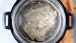 Top down view of Instant Pot with the flour just mixed in