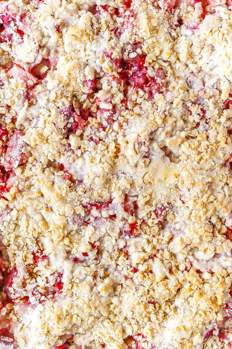 Top down view of a closeup of the Strawberry Rhubarb Bars in the tray before cut into bars