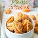 These Pumpkin Ricotta Cookies are lightly sweetened and spiced with cinnamon. Flakey, crisp, and addictive | imagelicious.com #cookies #fallbaking #pumpkin #pumpkinrecipes #russiancookies