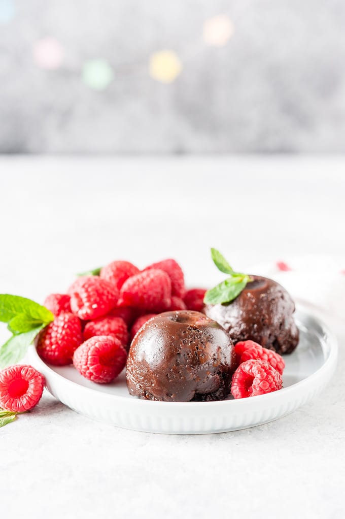 Dessert Plate with two Instant Pot Nutella Cake Bites and some raspberries on the side