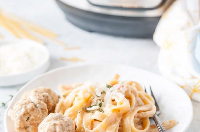 Plate with Instant Pot Creamy Pasta and Meatballs
