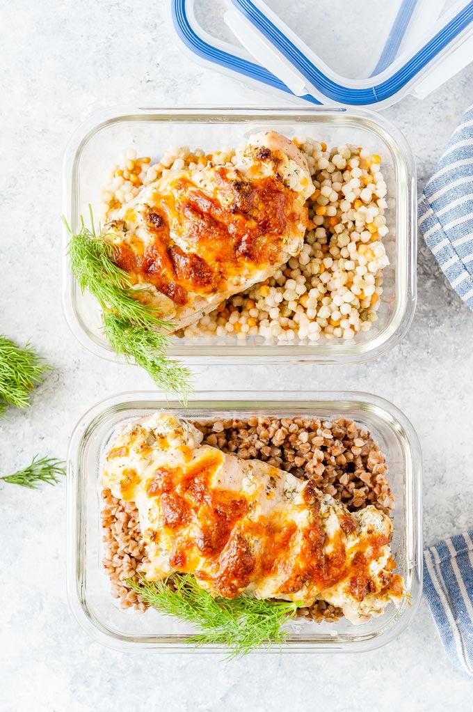 Two meal prep bowls with Goat Cheese and Dill Hasselback Chicken.