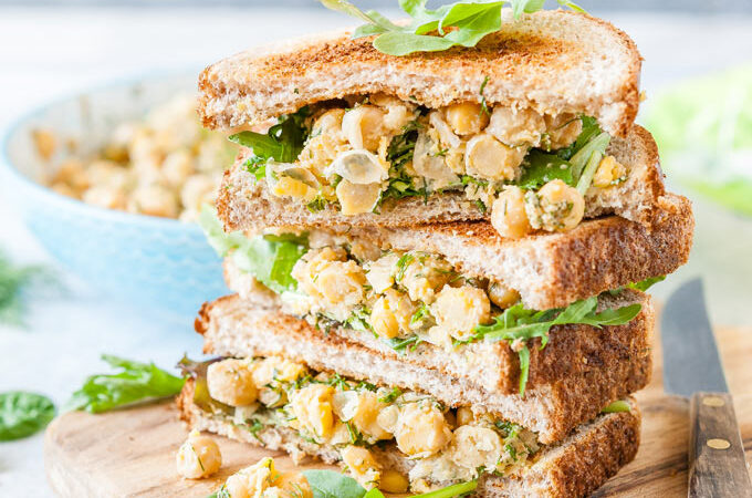 Stack of chickpea salad sandwiches.