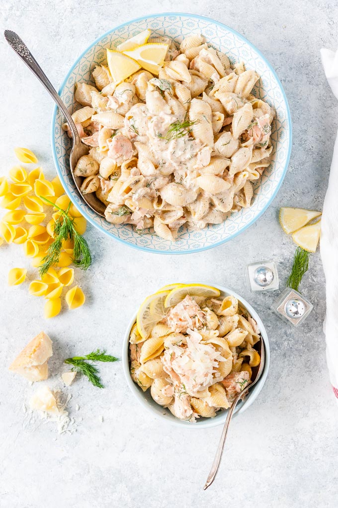 Top down view of two bowls with Creamy Salmon Pasta.