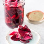 Pickled Beets on a small saucer.