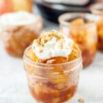 Apple Pie Filling in a jar topped with yogurt and granola.