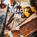 Treacle Tart is delicious, sweet, and very rich. It is surprisingly easy to make. It has a custard-like soft and caramel filling and delicious pastry. It is Harry Potter's favourite dessert and it'll become yours also | imagelicious.com #treacletart #harrypotter
